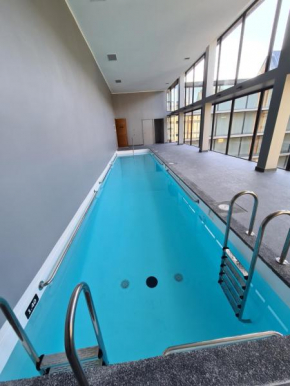 Departamento TOP Full Equipado Puerto Varas con piscina temperada y en primera Linea